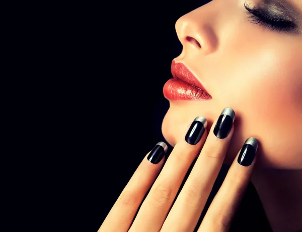 Woman with French manicure on nails