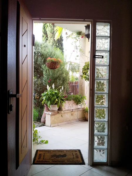 View through the open door to the patio