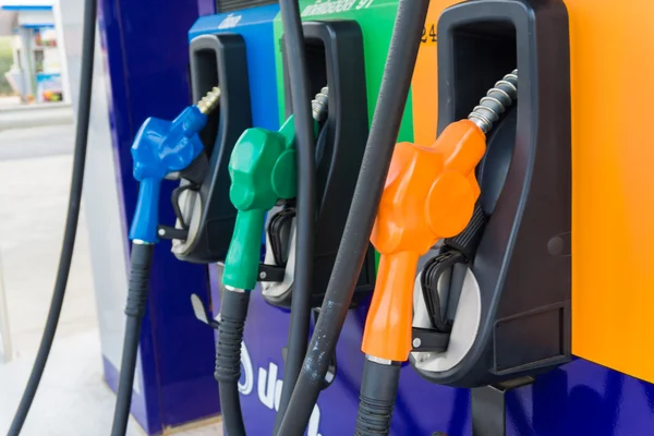 Close up of colourful fuel pumps