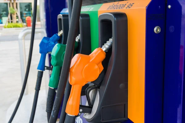 Close up of colourful fuel pumps