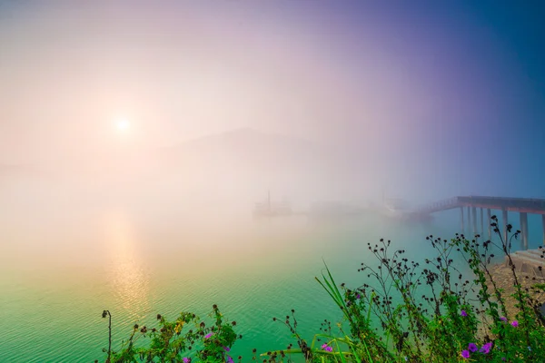 Sun Moon Lake at morning with fog
