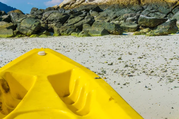 Yellow kayak on the sea. Kayaking on island