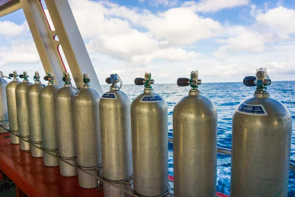 Oxigen tanks on boat for scuba diving