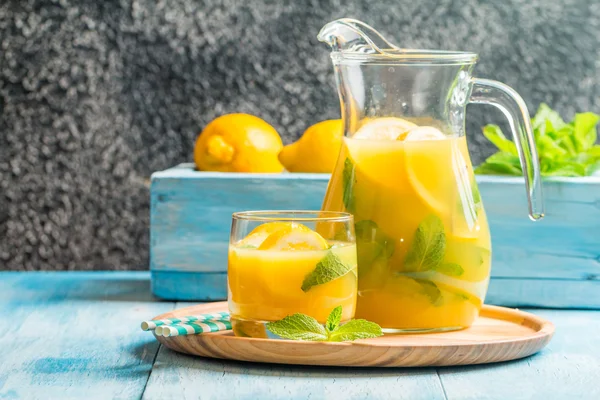 Lemonade in the jug and glass