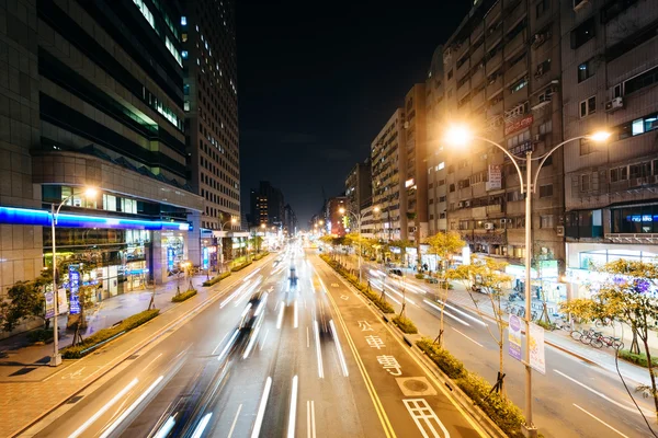 Traffic on Xinyi Road at night, in Taipei, Taiwan.