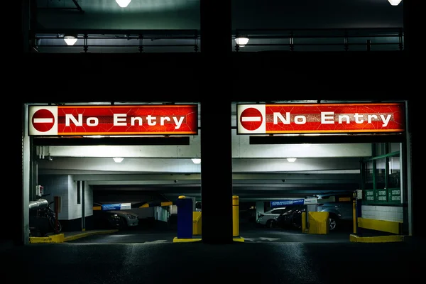 Exit of a parking garage at night, in Kensington Market in Toron