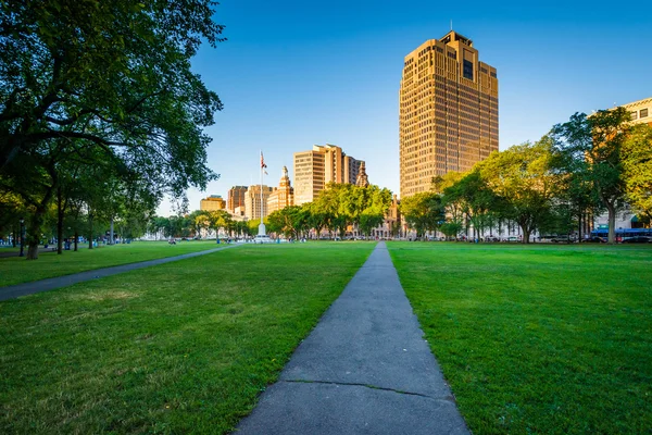 Walkway at the New Haven Green and buildings in downtown New Hav