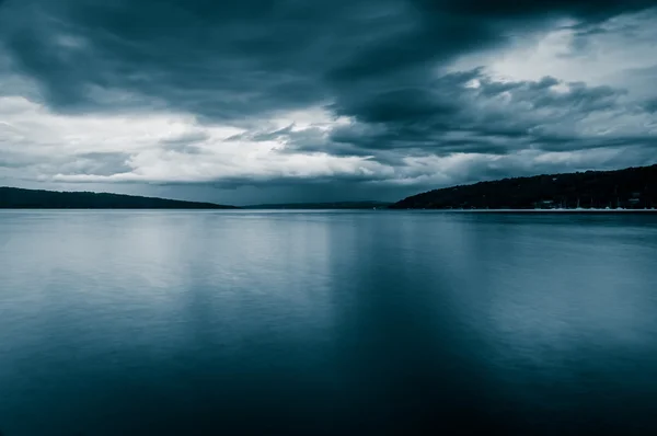 Dark storm clouds over Cayuga Lake, in Ithaca, New York.