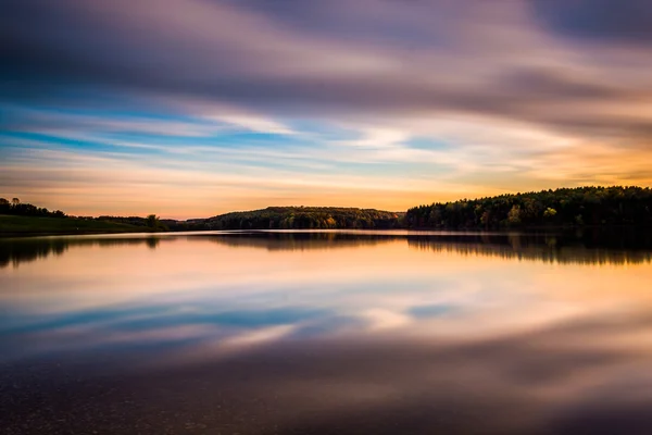 Evening long exposure of clouds moving over  Long Arm Reservoir,