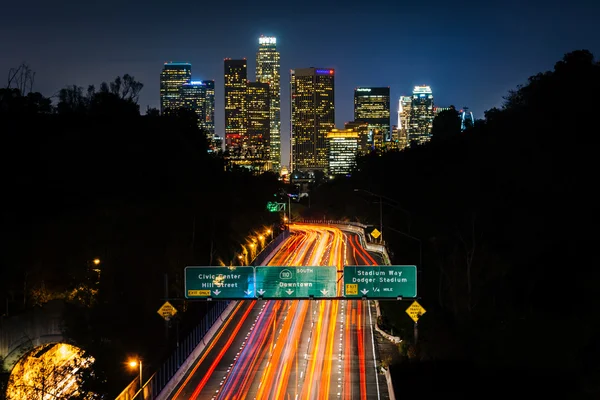 View of the 110 Freeway and downtown Los Angeles Skyline at nigh