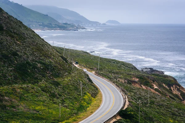View of mountains along the coast and Pacific Coast Highway, at