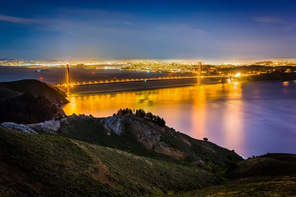 View of the Golden Gate Bridge at night, from Hawk Hill,  Golden