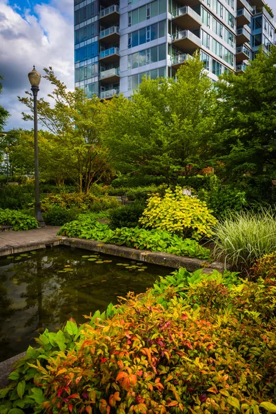 Garden and modern building at the waterfront in Portland, Oregon
