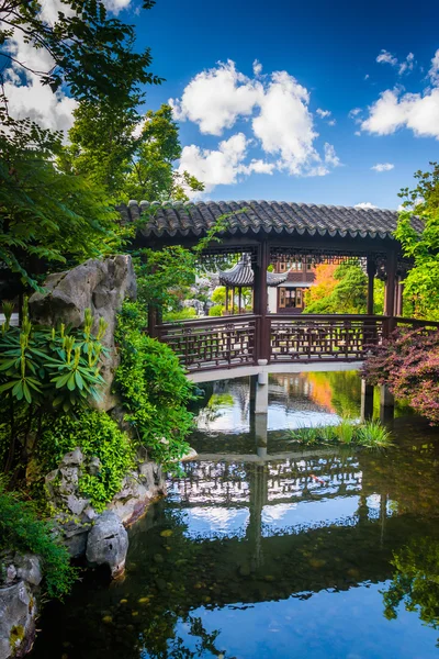 Bridge over a pond at the Lan Su Chinese Garden in Portland, Ore