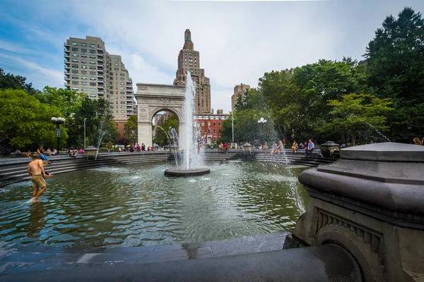 Fountains and the Washington Arch in Washington Square Park, Gre