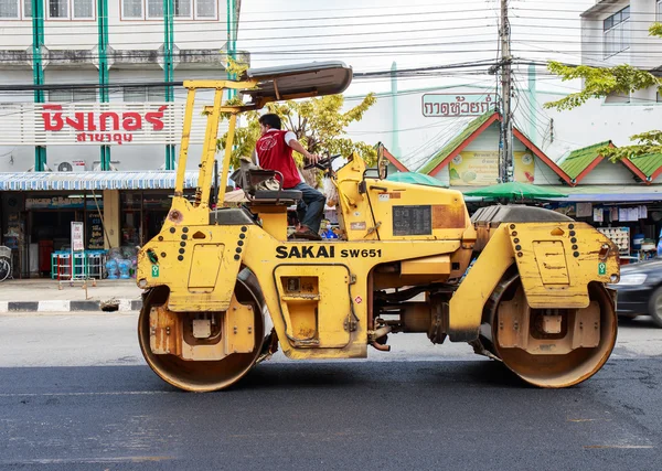 Light Vibration roller compactor at road construction and repair
