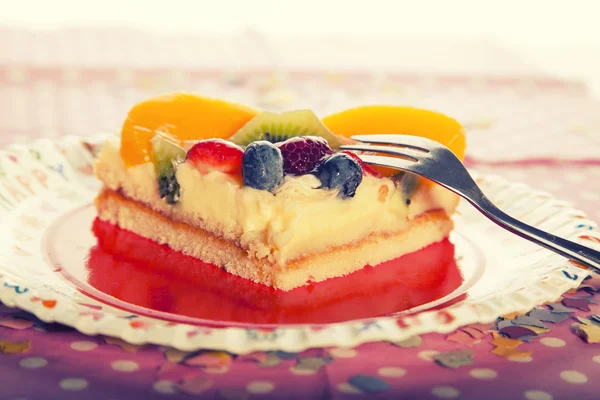 Fruit cake with strawberries, peaches, raspberries and other fruits,perfect summer refreshment,birthday cake