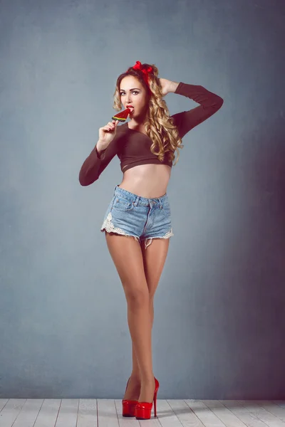 denim shorts and high heels