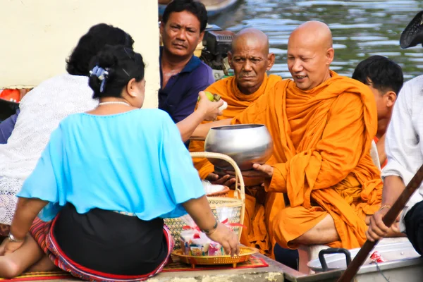 NONTHABURI, THAILAND - November 6 : Buddhist monk is the alms on