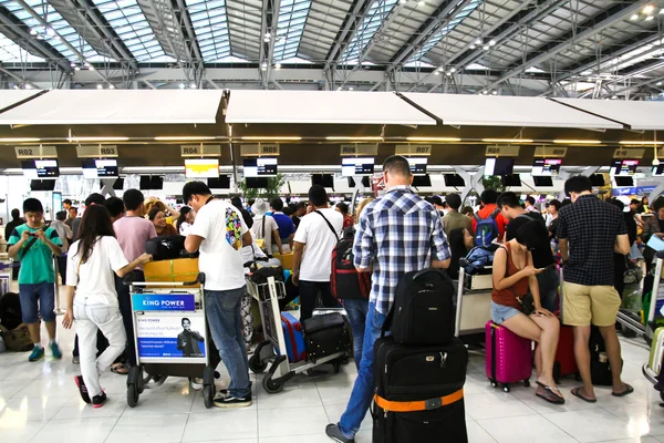 BANGKOK - FEBRUARY 17 : People waiting in check-in line R