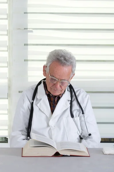 Doctor reading book