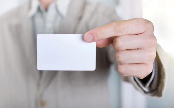 Businessman showing business card