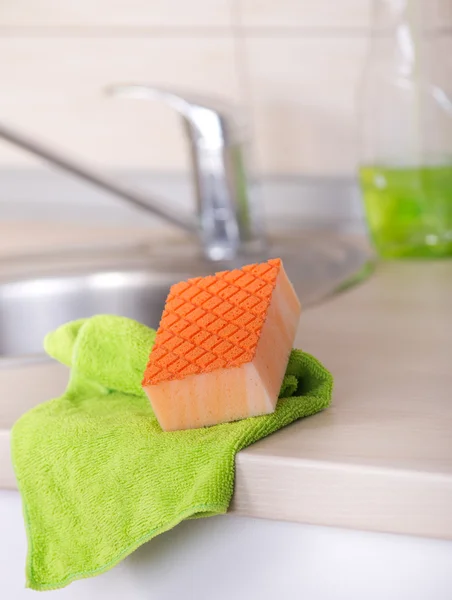 Dishwashing tool on kitchen countertop