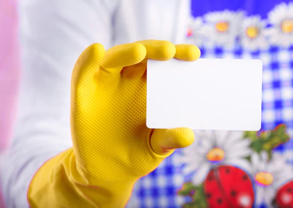 Cleaning lady showing business card