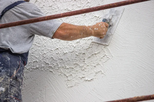 Decorative plaster applied on the surface by a steel trowel