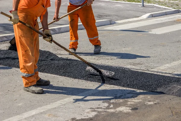 City crew install a new speed bump 3