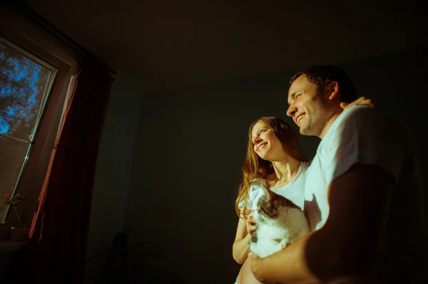 Couple expecting baby. Happy future dad and his pregnant wife