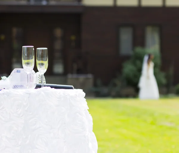 Bridal bouquet. White wedding chairs. Wedding interior