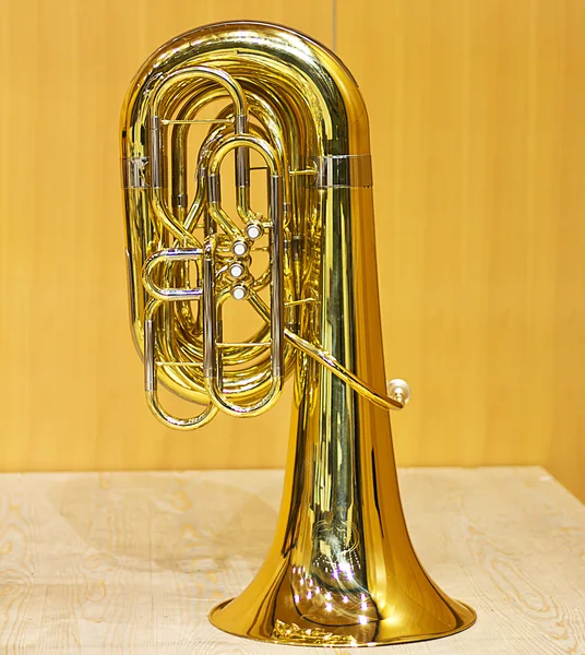 Golden tuba in the concert hall.Wind instrument. Copper musical instrument