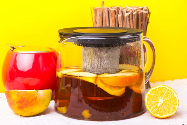 Glass teapot with black tea. Ginger tea with cinnamon. Tea for Health