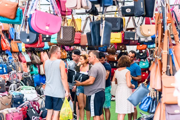 ISTANBUL, Turkey - November 2, 2015: Sale bags at Turkish bazaar. The Grand Bazaar is one of the largest and oldest covered markets in the world.