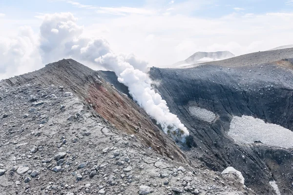 A pillar of gas on the slope of the volcano Tolbachik on Kamchatka