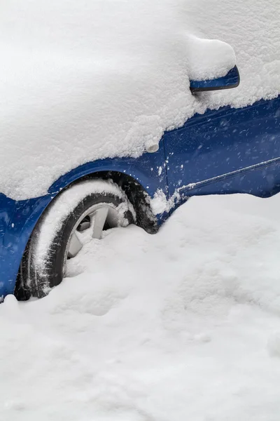 Snow covered car closeup