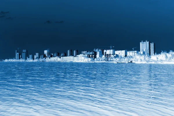 High-rise buildings standing at the water's edge