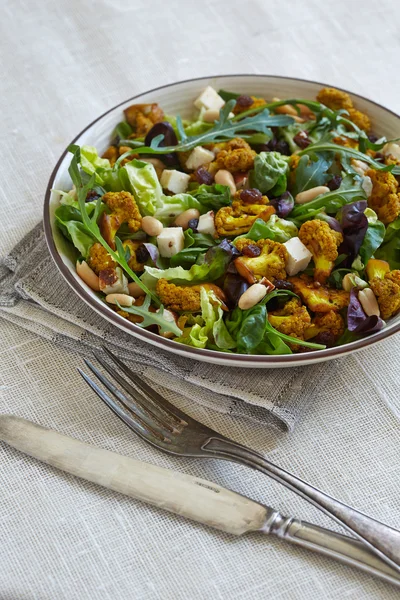 A plate of vegetable salad