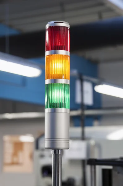 Red, yellow and green lamp in a factory