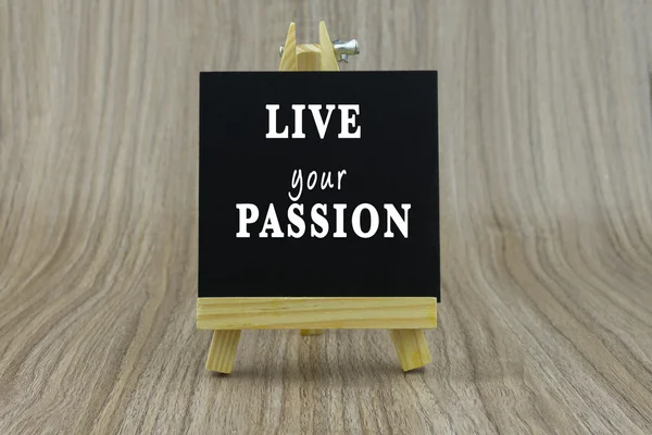 Art board, wooden easel, front view with word Inspiration quote : LIVE your PASSION