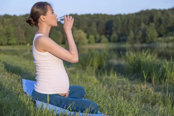 Pregnant woman, park, yoga, asian, Russia