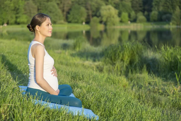 Pregnant woman, park, yoga, asian, Russia