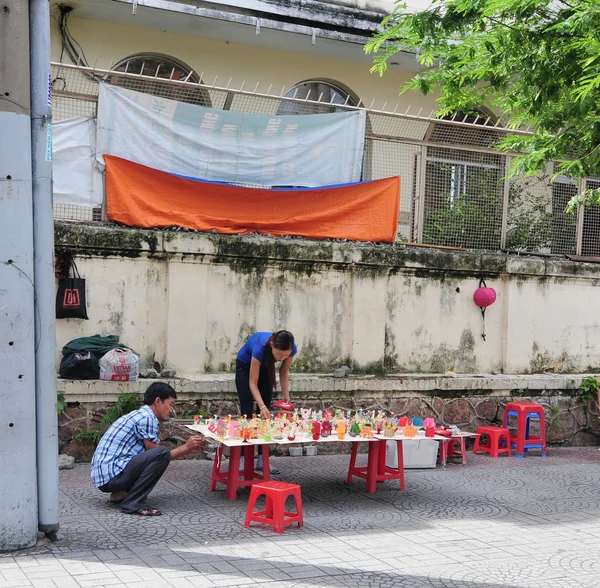 Vietnamese people selling handmade product