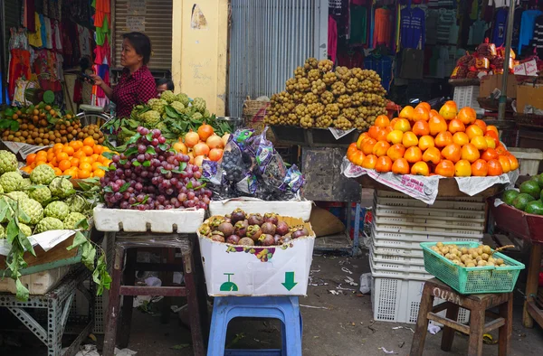 Fruit stalls at a local market in Hanoi
