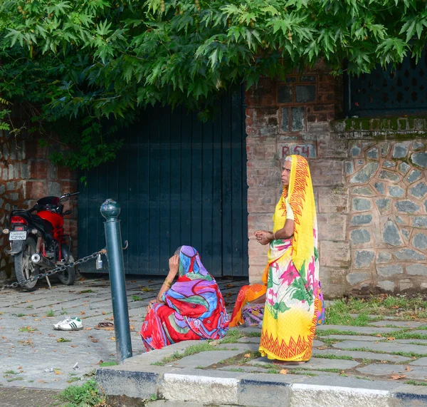Indian women on street wearing traditional sari