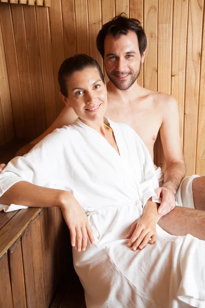 Couple ralaxing in sauna