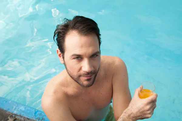 Young man drinking juice