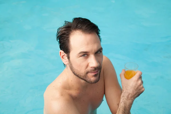 Young man drinking juice