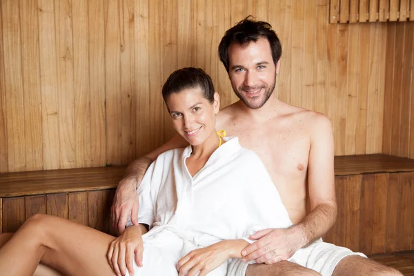 Couple ralaxing in sauna